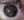 Figure 1. The preoperative appearance of the left eye. Note the irregular pupil, hypermature traumatic cataract, and loss of zonular support in the temporal zone. A temporal corneoscleral scar is also evident.