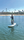 Figure 1. Dr. Jarstad stand up paddle boarding in Newport Beach, California with her puppy, Wilson.